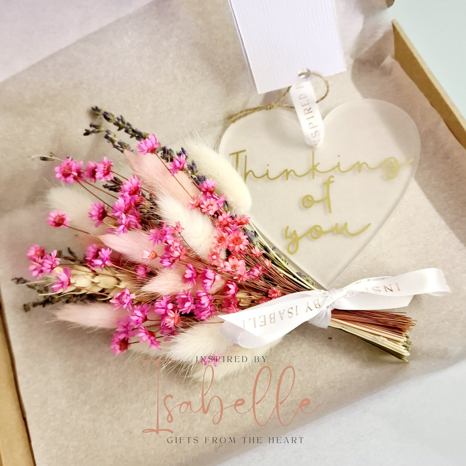 Thoughtful box letterbox gift with dried flowers and heart shaped ornament in packaging